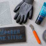 reparer vitre avec outils sur plan de travail